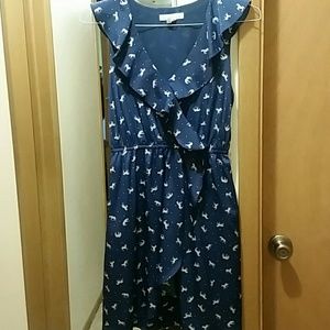 Royal blue dress adorned with horses